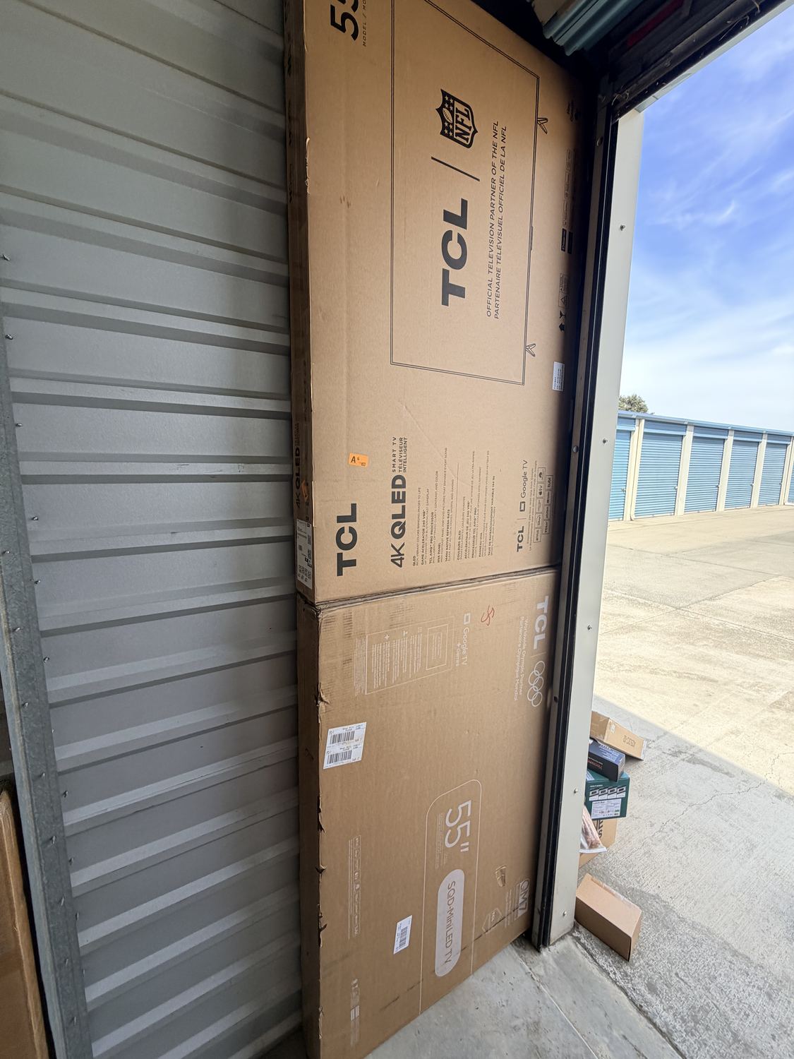 Boxed televisions inside a storage unit